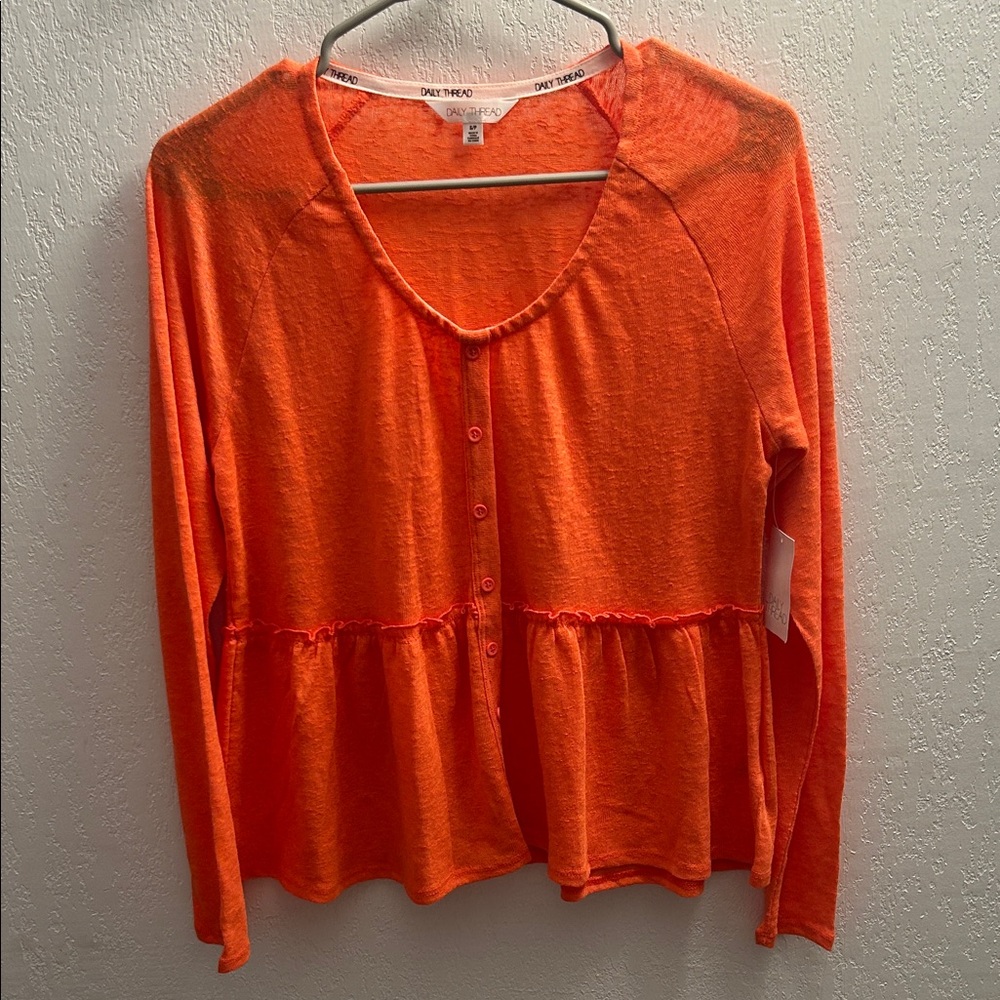 47. Daily Thread Orange Button-Front Peplum Knit Top